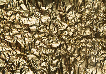 wrinkled golden metal background 