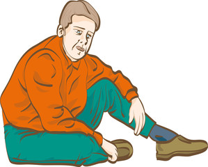 homme assis à terre