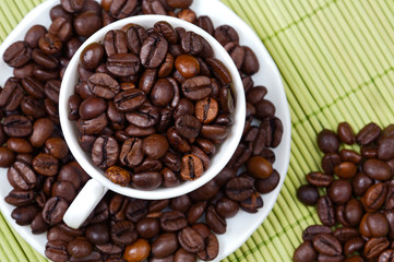 Coffee beans in a cup