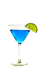 Martini glass with a twist of lime on white background