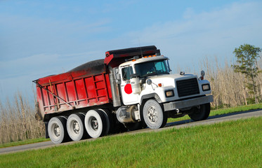 Dump truck transporting heavy load