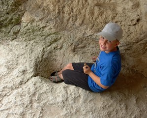 boy in cave