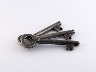 three old fashioned isolated keys