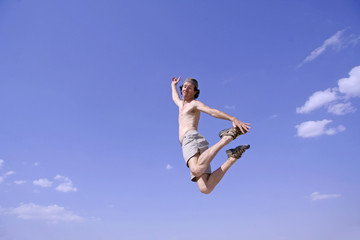 Obraz premium healthy happy man jumping in joy of life