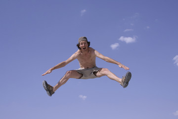 Obraz premium healthy happy man jumping in joy of life