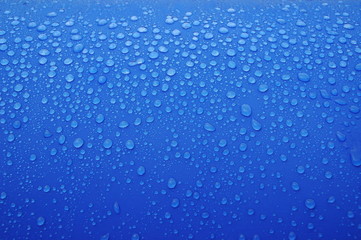 Naklejka na ściany i meble krople deszczu na niebieskim ręcznik