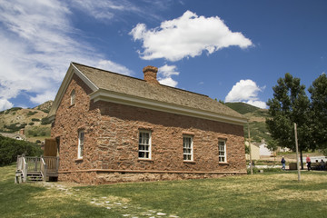 Fototapeta na wymiar Pioneer Brick Schoolhouse