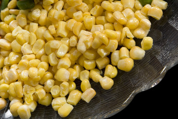Precooked corn on a glass dish