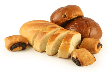 The cut long loaf and rolls on a white background.