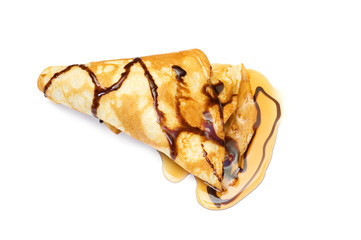 Pancake with honey covered with chocolate syrup