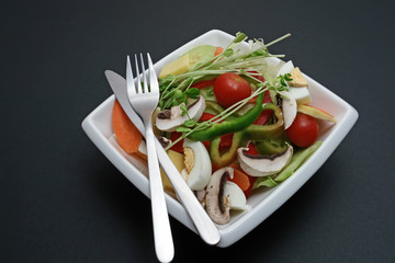 salad on white square plate