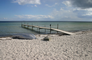 Upturned boat on the beach