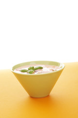 Fruits with yoghurt  over a orange background 