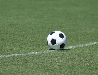 Fototapeta na wymiar Lonely soccer ball 