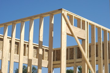 New home wall framing with blue sky back ground.