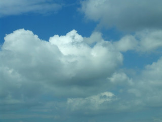 Fototapeta premium Blue bright sky with many white clouds