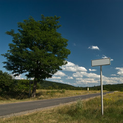 Blank road sign on the side of the road