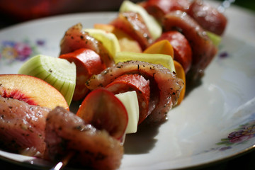 Coloured skewers on the plate