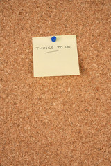 Post it with things to do written on. Corkboard background