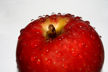 Red apple with water drop