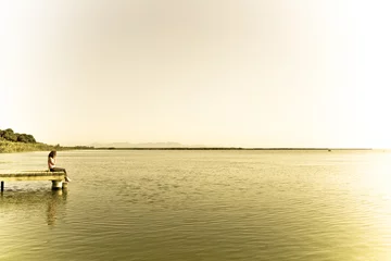 Foto op Canvas Girl in the lake © JoseASReyes