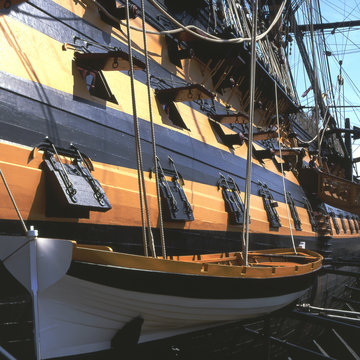 Longboat on side of HMS Victory at Portsmouth, Hampshire, Englan