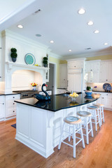 extravagent kitchen in white and black granite