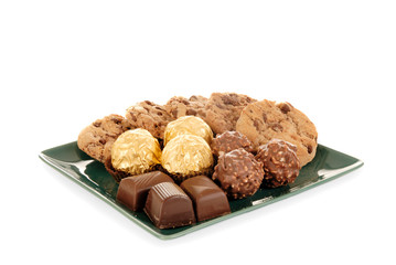 sweets on green glass plate