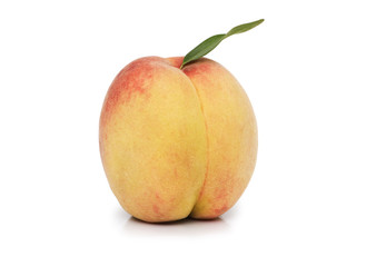 Peach with leave isolated on the white
