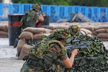 People playing war games in the army camps