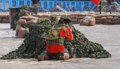 People playing war games in the army camps