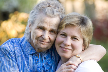 elderly woman with her daughter