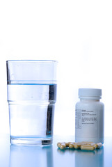 Pills and glass of water