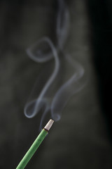 Joss sticks and white smoke