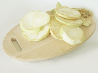 cutting celery root  slices