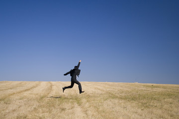 a businessman showing his sucess