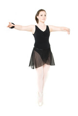 Naklejka premium A young girl stretching