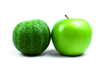 Mini water melon and green apple. Decoration pumpkin.