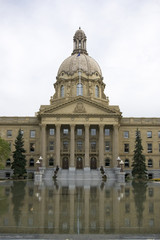 Alberta Legislature building in reflecting pool.