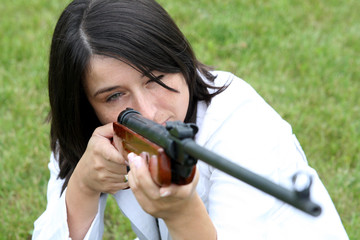 Young woman with a rifle