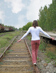 Girl goes on rail