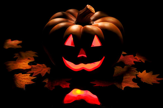 Halloween pumpkin on black.