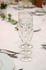 large dinner table set up for a lot of people