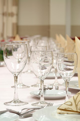 large dinner table set up for a lot of people