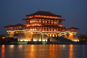 Fotobehang Tang building at night with reflection © Steve100