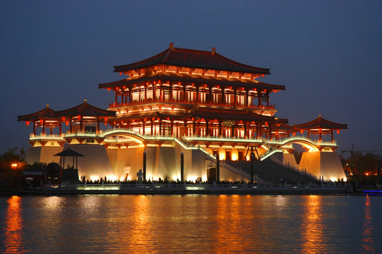 Fototapeta Tang building at night with reflection