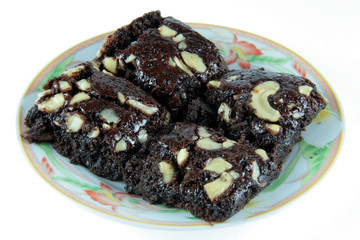 four chocolate brownie fudge  served on a plate