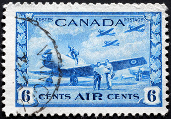 Canadian airmail stamp showing World War II fighter planes