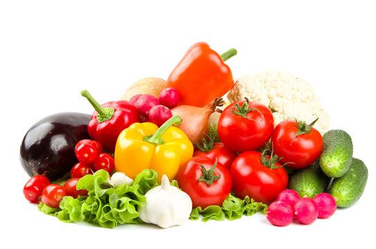 Fototapeta Pile of vegetables isolated on white