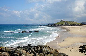Low spring tide at Porthmeor beach in St. Ives, Cornwall, UK